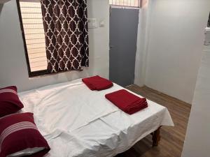 Postel nebo postele na pokoji v ubytování MR Lodge