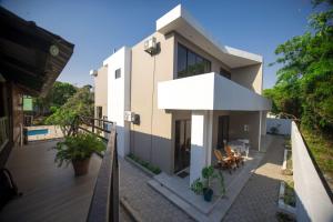 Swimmingpoolen hos eller tæt på Vila Luísa Bilene