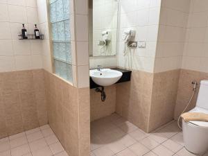 Et badeværelse på Happy Fish Guesthouse