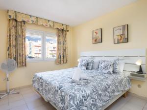 Ένα ή περισσότερα κρεβάτια σε δωμάτιο στο Live Candelaria Atlantic Home