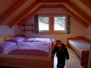 Ein Bett oder Betten in einem Zimmer der Unterkunft Laberer by Schladmingurlaub