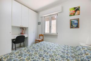 En eller flere senge i et værelse på Villa Padulella - Goelba