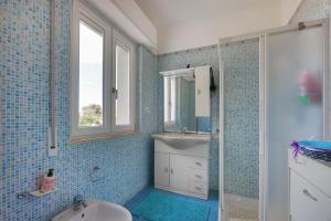 Et badeværelse på Villa Padulella - Goelba + 13 billeder