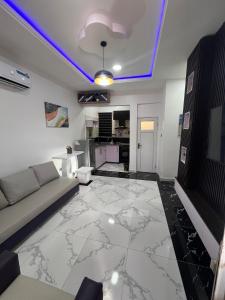 TV a/nebo společenská místnost v ubytování RBZ Apartments