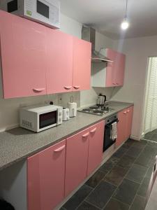 Køkken eller tekøkken på Modern & Cosy 2-Bedroom Flat in Sunderland