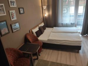 Кровать или кровати в номере BLISKO DEPTAKA - Apartamenty i Pokoje