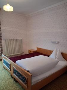 Postel nebo postele na pokoji v ubytování Pension Karner