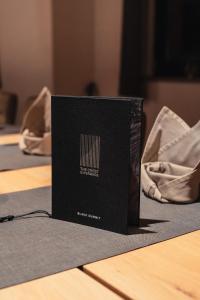 a black box sitting on top of a table at Black Summit Samnaun Boutique Hotel in Samnaun