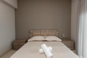 Postel nebo postele na pokoji v ubytování Mary Luxury House