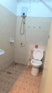 Ένα μπάνιο στο Didim Guest House Patong