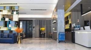 Гостиная зона в Echarm Hotel Xiangyang Erqi