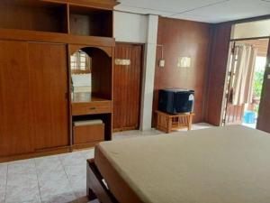 TV a/nebo společenská místnost v ubytování Palm Point Village