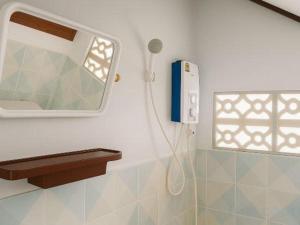 Koupelna v ubytování Palm Point Village + 217 fotografií