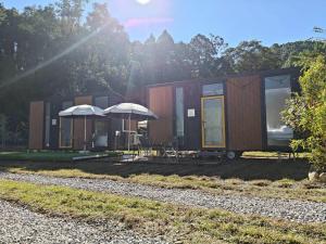 a tiny house on the side of a road at Forest Star Cottage X by Tiny Away in Hsin-ch'eng