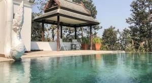 Πισίνα στο ή κοντά στο Amaravati Wellness Center