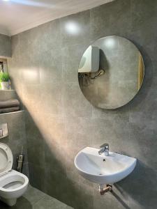 Baðherbergi á Angel Hotels