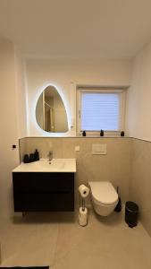 Ванная комната в Ferienwohnung RheinZeit