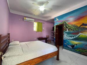 Giường trong phòng chung tại Lokoo Resort