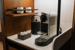 Sadržaji za pripremu kafe i čaja u objektu Hotel Trianon