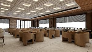 Un restaurant u otro lugar para comer en Namaste Corbett Resort and Spa 4 fotos más