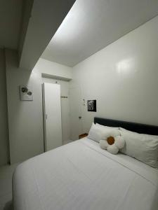 Postel nebo postele na pokoji v ubytování Naga City River View 1BR U1 Apartment