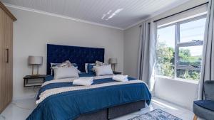 En eller flere senge i et værelse på Oceanberg apartments