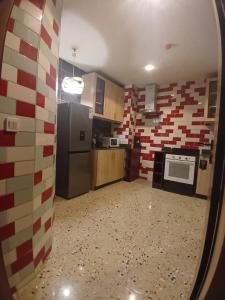 Kuchyň nebo kuchyňský kout v ubytování Sci Lomathare