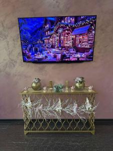 Un televizor și/sau centru de divertisment la Nork Boutique Hotel