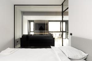 En eller flere senge i et værelse på Central Stay Apartments - 300m from Old town