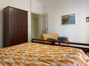 Ένα ή περισσότερα κρεβάτια σε δωμάτιο στο Il Piccolo Gufo