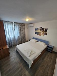 Ένα ή περισσότερα κρεβάτια σε δωμάτιο στο Sunshine