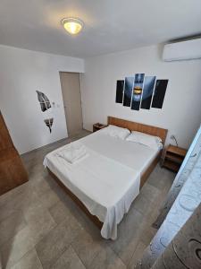 Ένα ή περισσότερα κρεβάτια σε δωμάτιο στο Sunshine