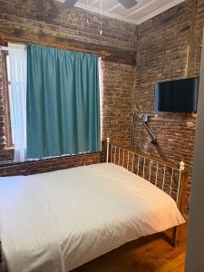 TV a/nebo společenská místnost v ubytování Nil Pansiyon