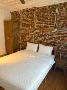 Postel nebo postele na pokoji v ubytování Nil Pansiyon