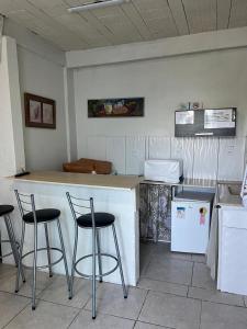 Η κουζίνα ή μικρή κουζίνα στο Pousada Cantinho Azul