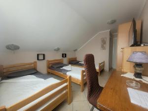 Postel nebo postele na pokoji v ubytování Koba + 14 fotografií