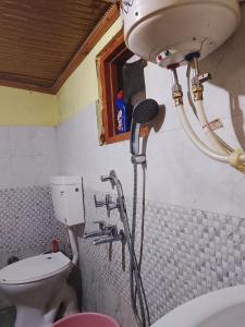 Et badeværelse på Apple garden cafe and stay