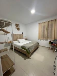 un dormitorio con una cama y una litera en Casa Mencía, en Plasencia 34 fotos más