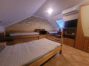 Postel nebo postele na pokoji v ubytování Koba