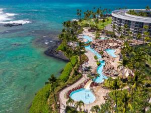 an aerial view of the pool at the resort at ❤PiH❤ BLUE LAGOONHilton Resort PassHeated Pool Spa in Waikoloa