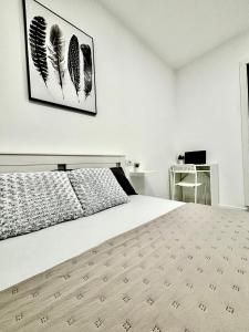 En eller flere senge i et værelse på Casa Capitan Coliving Digital Nomads