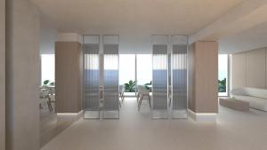 Postel nebo postele na pokoji v ubytování Kos Aktis Art Hotel