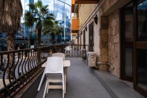 Balkón nebo terasa v ubytování Napoli Suites Studios Aparthotel