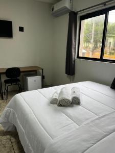 Postel nebo postele na pokoji v ubytování Périco Hotel + 24 fotografií