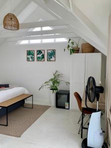 Кровать или кровати в номере Imhoff's Sweet Escape