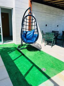 a batting cage with a swing on a patio at La Coruña Flat Makaranduba in Porto De Galinhas