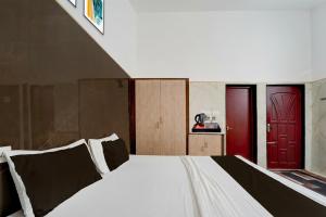 Imagine din galeria proprietății Super Collection O Perumalmalai Bus Terminal Formerly Raja Garden Hill View în Perumālmalai +23 fotografii