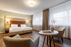 Postel nebo postele na pokoji v ubytování Hotel Engel