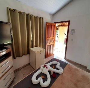 Μια τηλεόραση ή/και κέντρο ψυχαγωγίας στο POUSADA ACONCHEGO CHAPADA