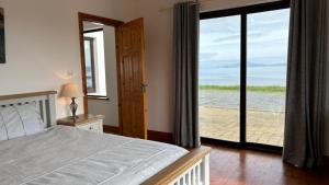 Giường trong phòng chung tại Makeelan House